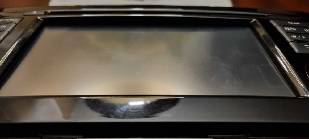 Nissan J11 radio/nawigacja, panel AC