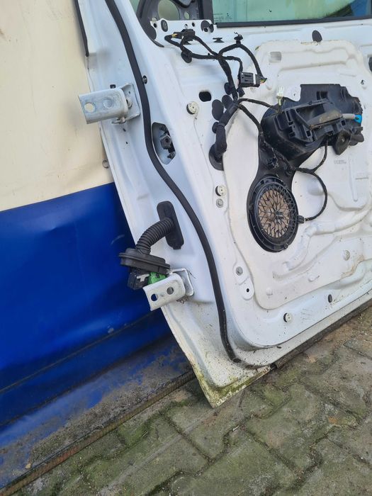 Peugeot Partner III drzwi przód prawe Berlingo IV