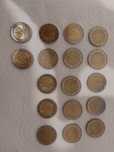 Moedas comemorativas e correntes circuladas