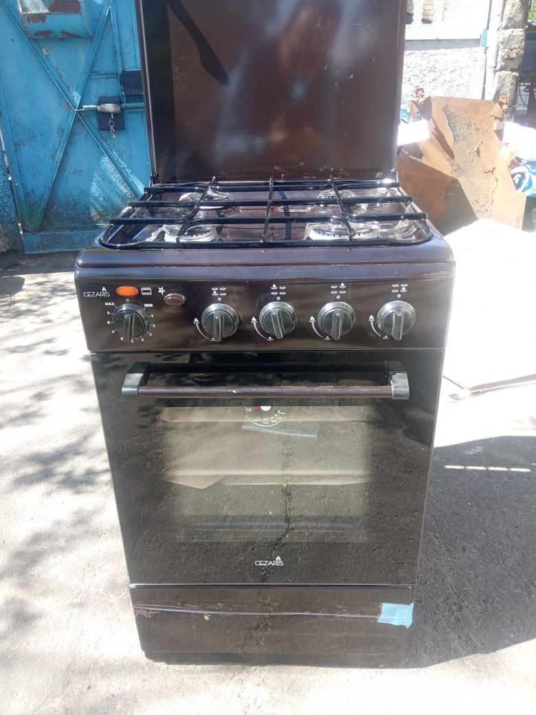 Плита газовая новая.