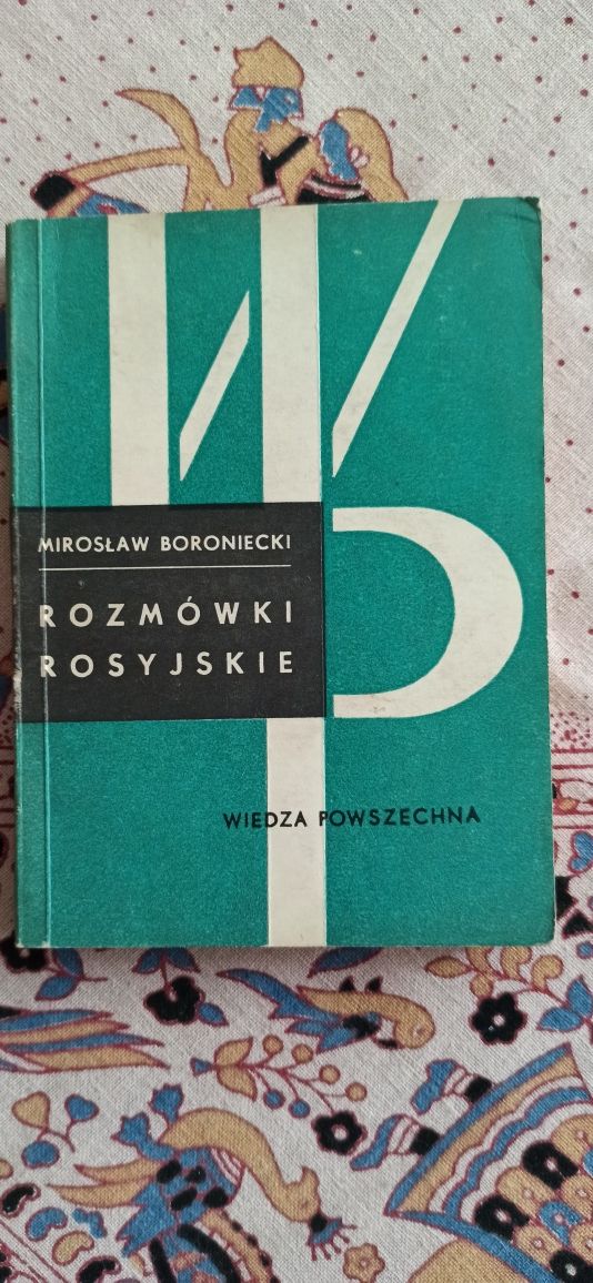 Cztery "Rozmówki" w różnych językach.