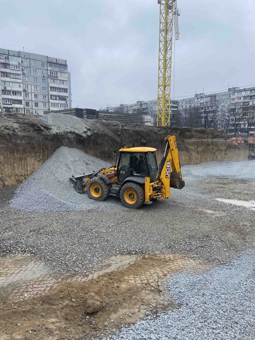 Услуги экскаватора-погрузчика Запорожье