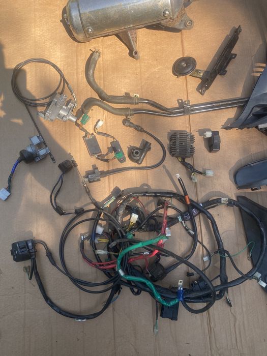 Kymco Grandink 125 owiewka licznik lampa koło zacisk amortyzator bak