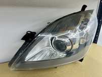 Lampa lewy przód Opel Zafira B Bi-Xenon skrętny z AFL. Kompletna, EU.