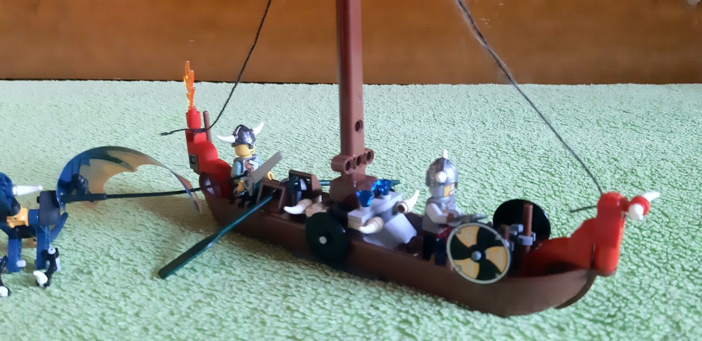 Lego Vikings 7016 Boat against Wyvern