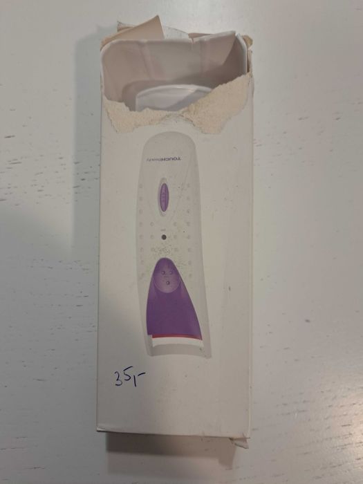 Zalotka, elektryczne szczypce do rzęs.