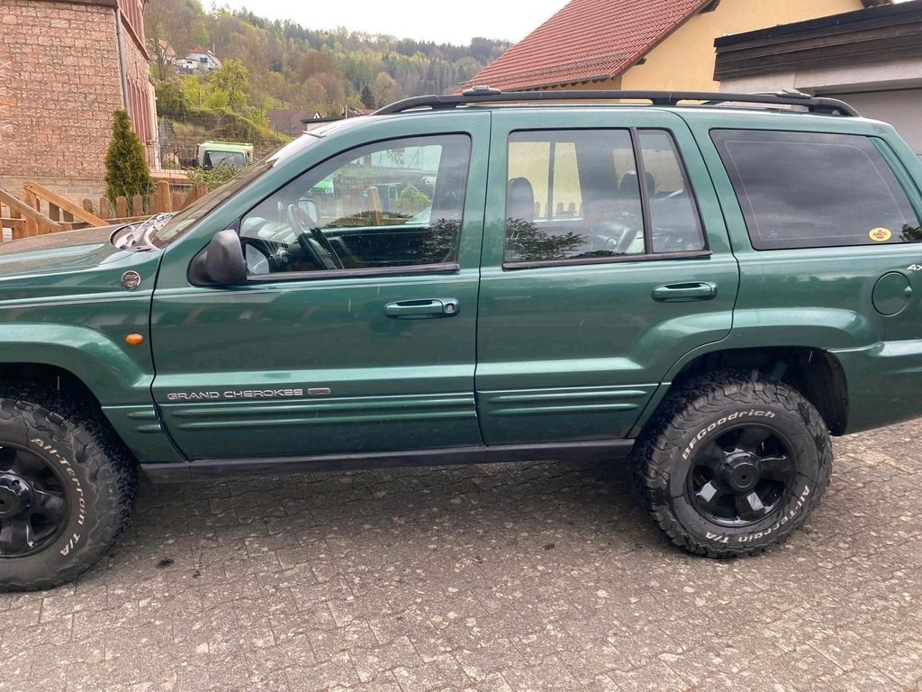 Запчастини jeep cherokee wj 3.1 td двері крила капот фари кардан міст