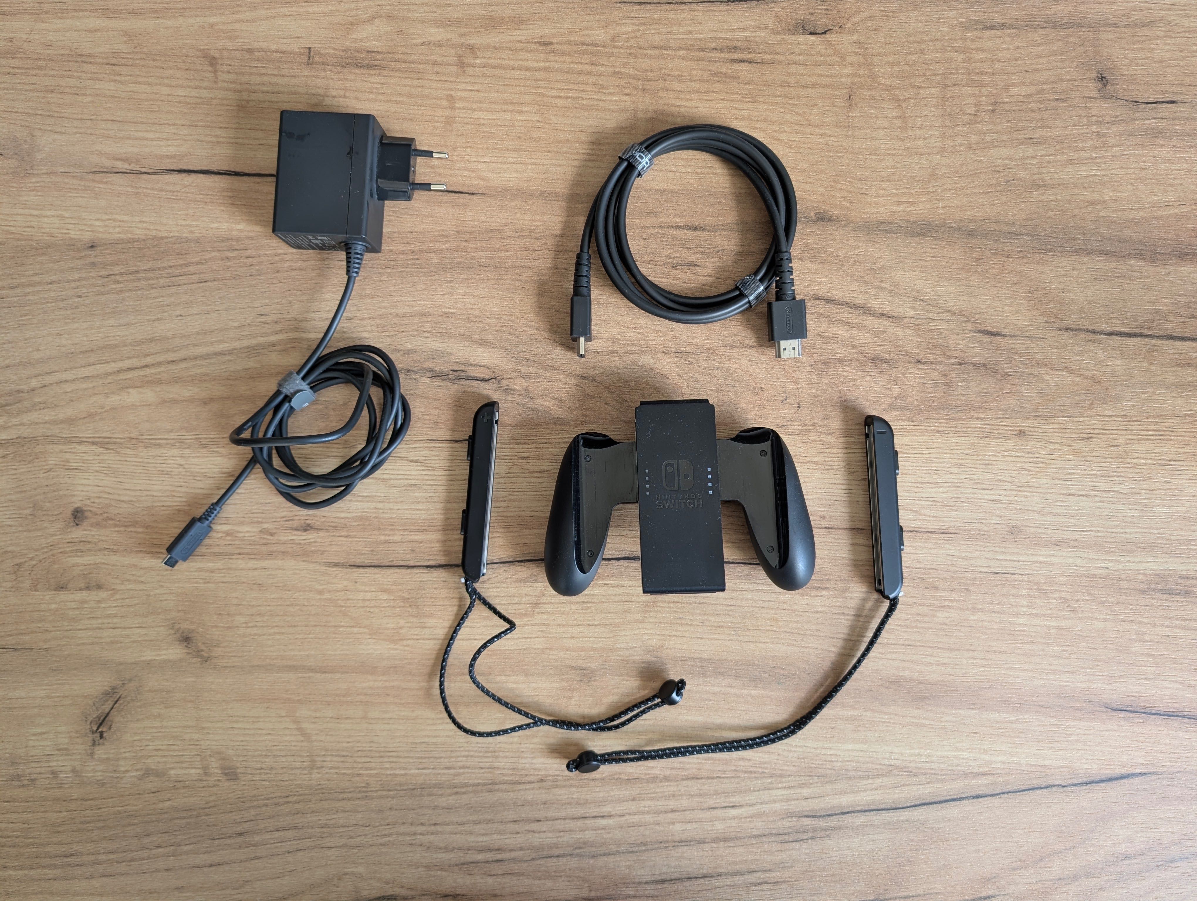 Nintendo Switch OLED, super stan, oryginalny zestaw, dużo dodatków