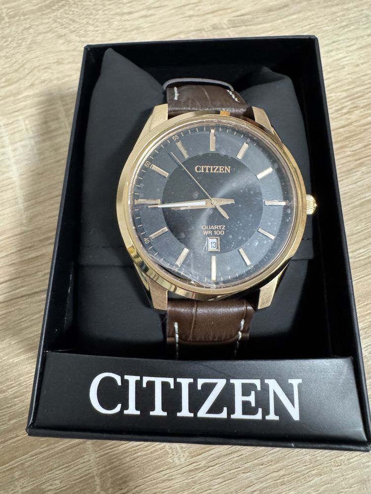 Citizen Quartz BI1033-04E - класика в чорному та золоті, оригінал 42мм