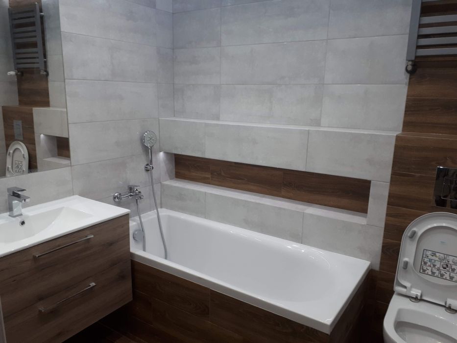 Układanie płytek, prace hydrauliczne , remont łazienek .