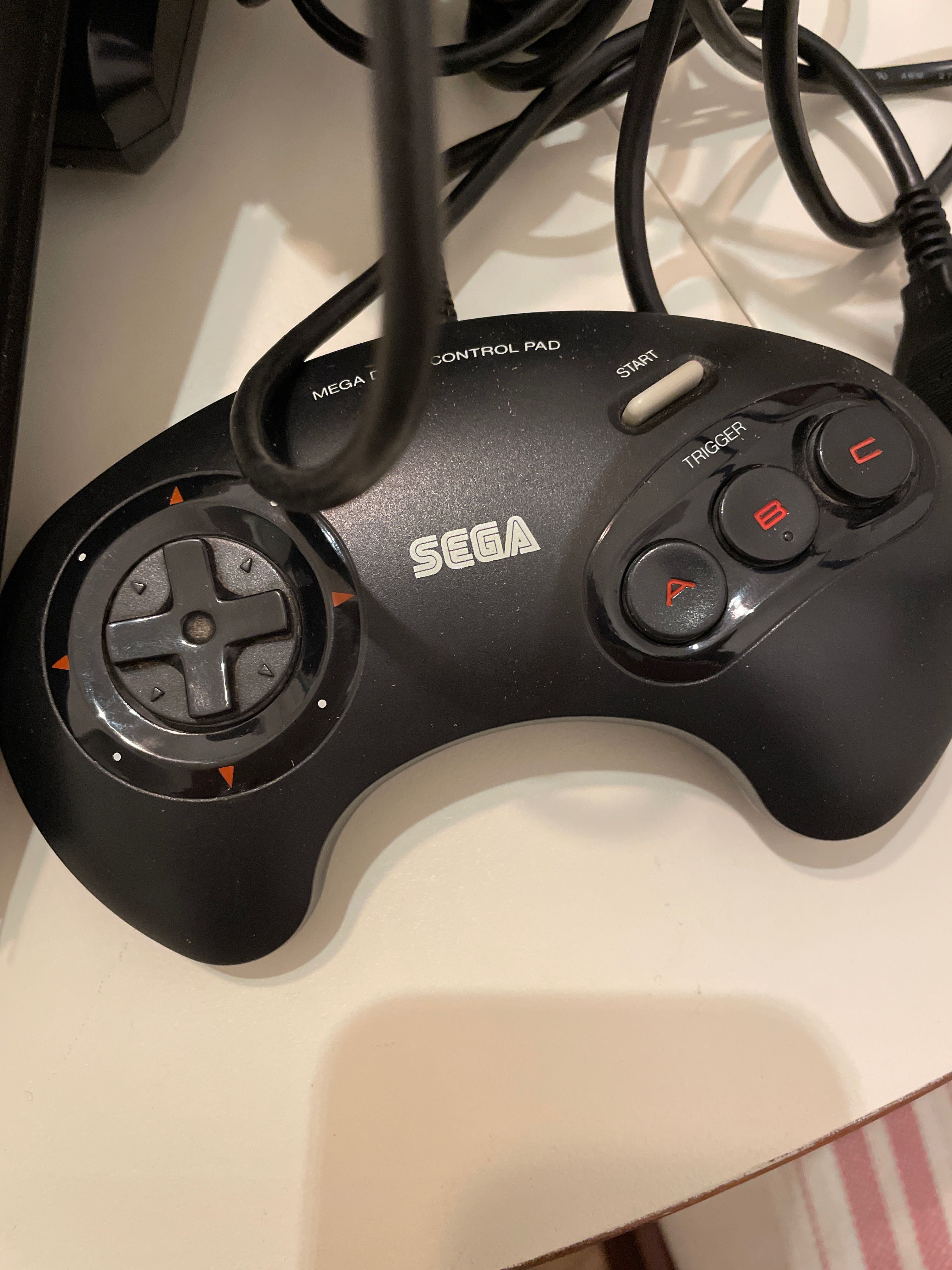 Sega Mega Drive com jogo e adaptador