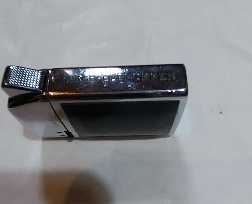 Isqueiro antigo Sim