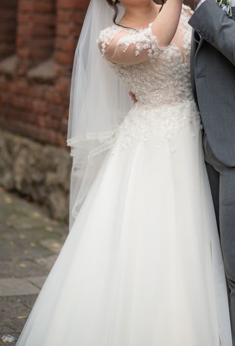 Оренда,продаж Весільне плаття молочного кольору