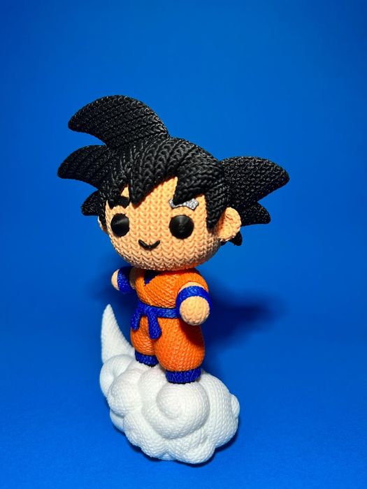 Goku surfando em nuvem - efeito crochê