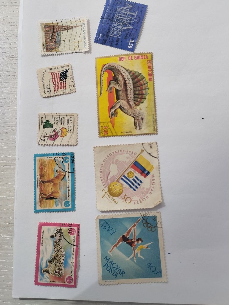 Różne znaczki. Gwinea Kanada USA Chorwacja