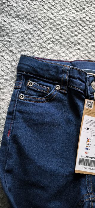 Nowe spodnie jeansowe coccodrillo r. 98
