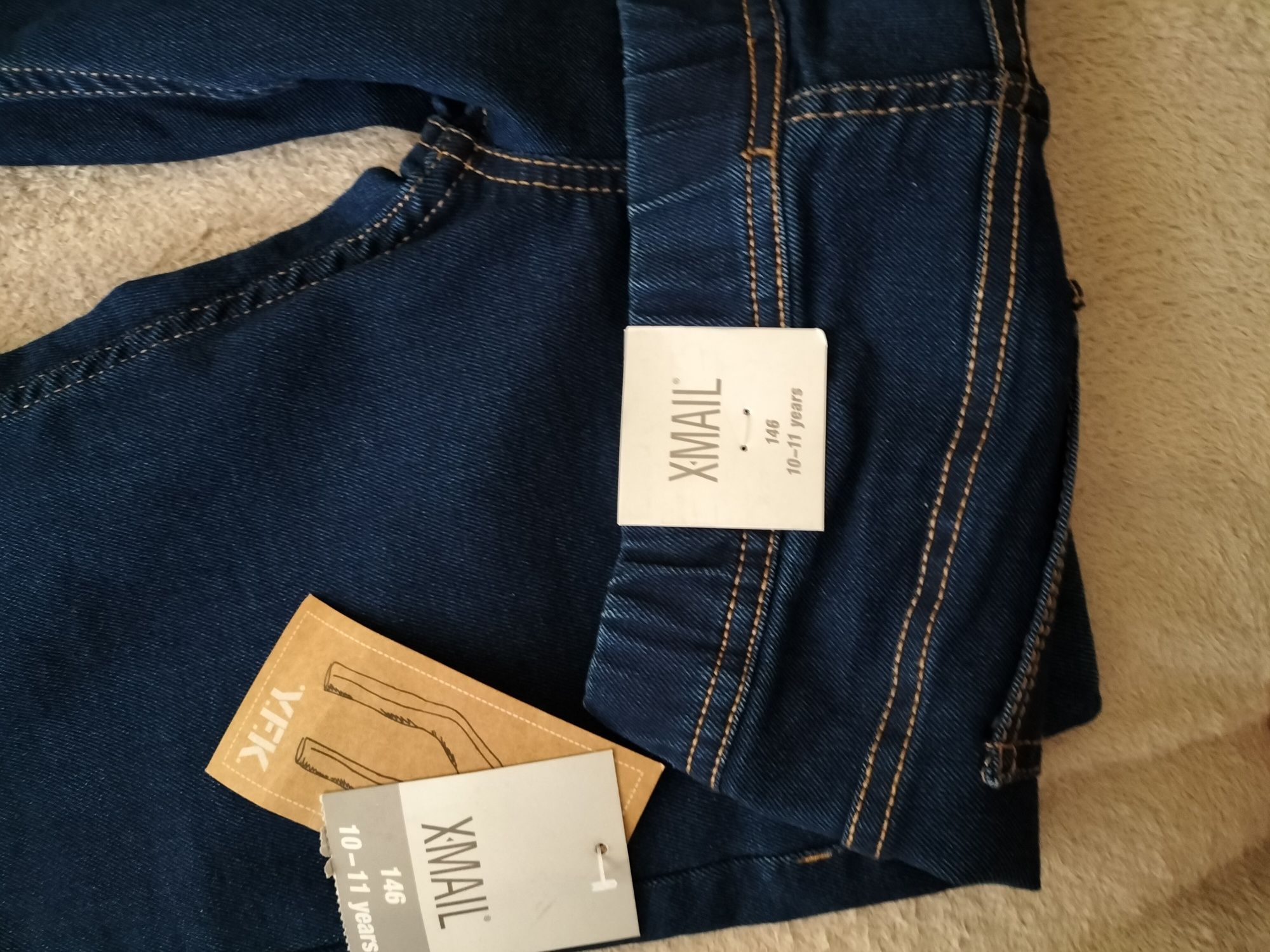 Nowe Spodnie jeansowe 146 dla dziewczynki