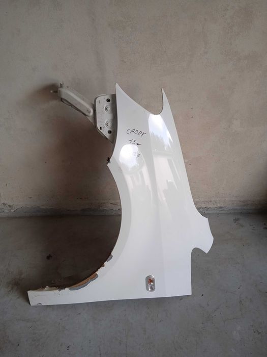 Błotnik lewy VW Caddy 10-15r
