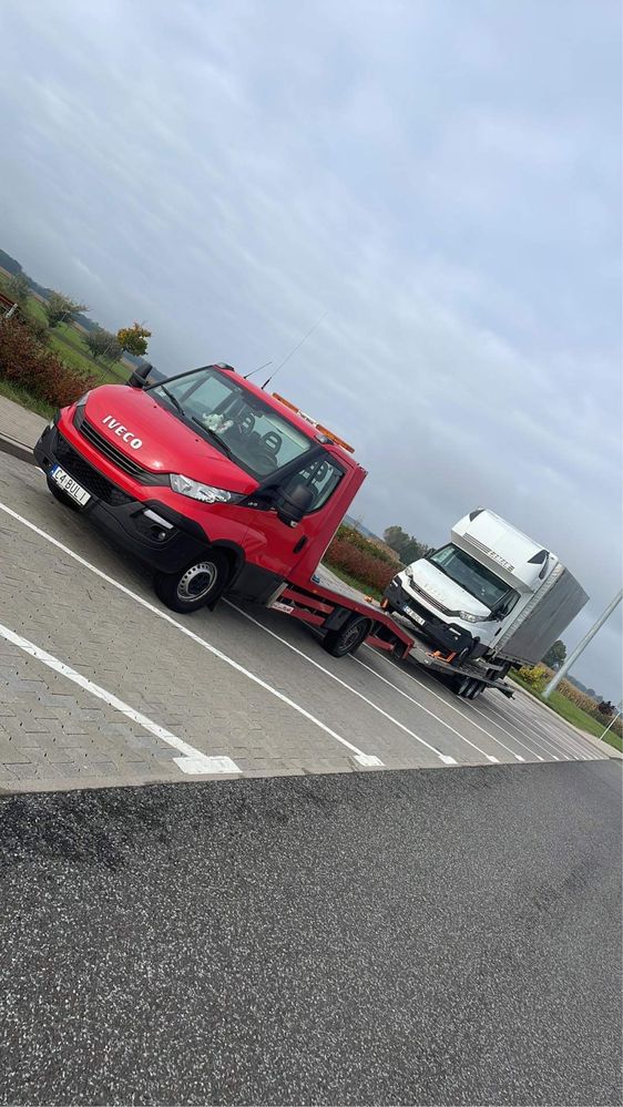 Usługi Transportowe (Pomoc Drogowa24h przewóz pojazdów oraz maszyn)