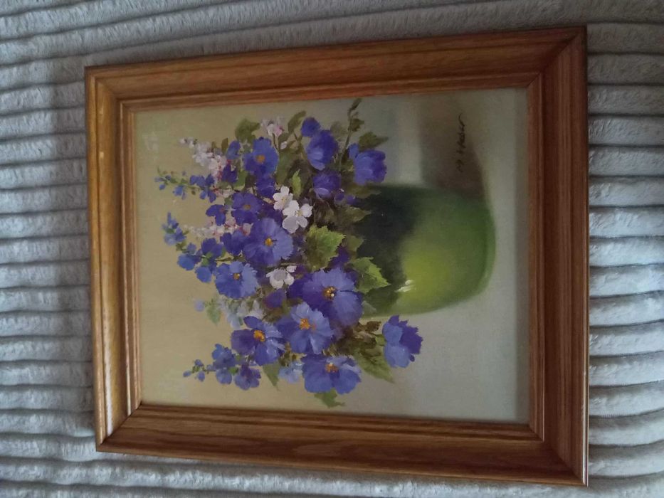 Obraz w drewnianej ramie.