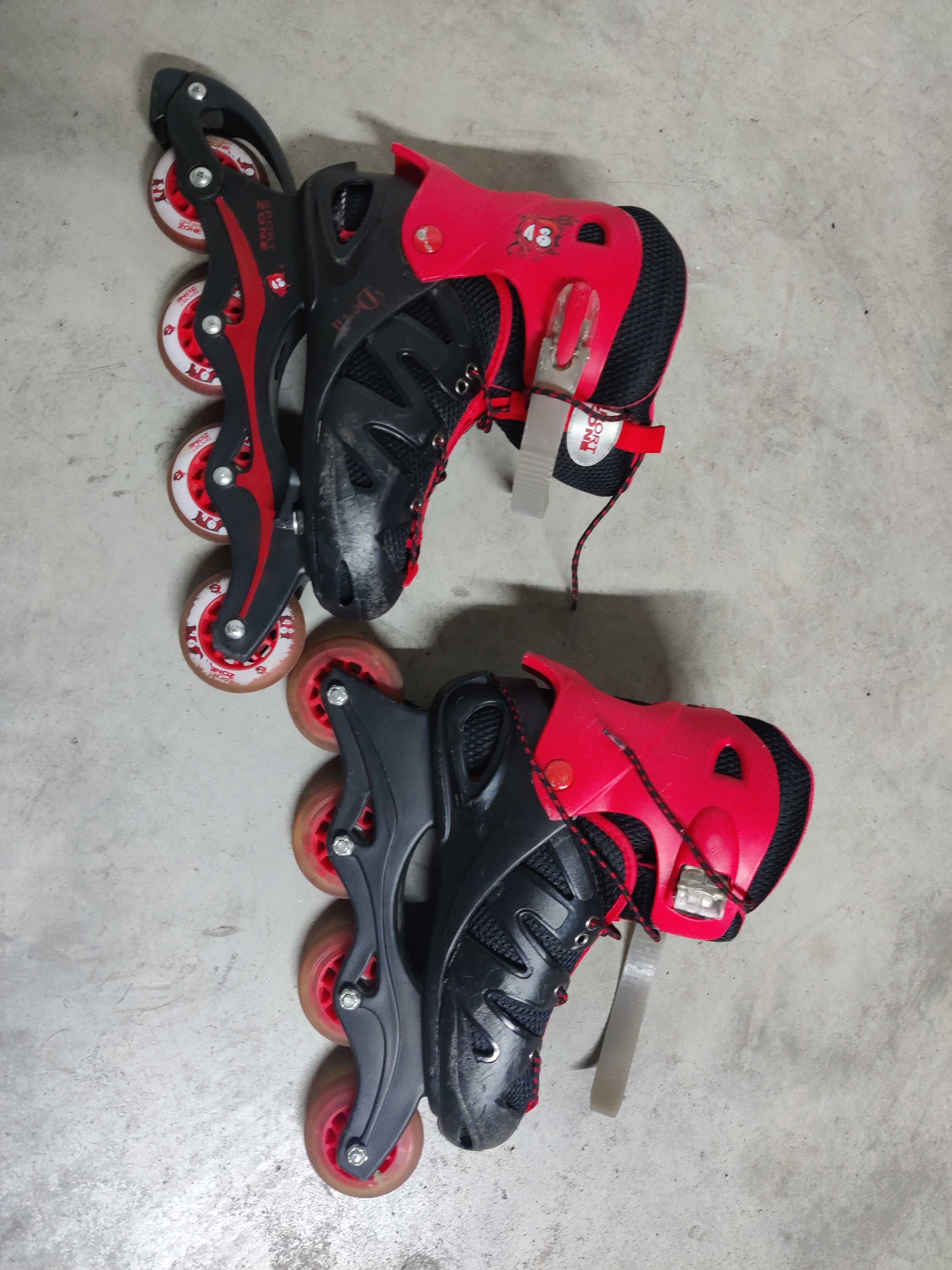 Patins em linha vermelhos