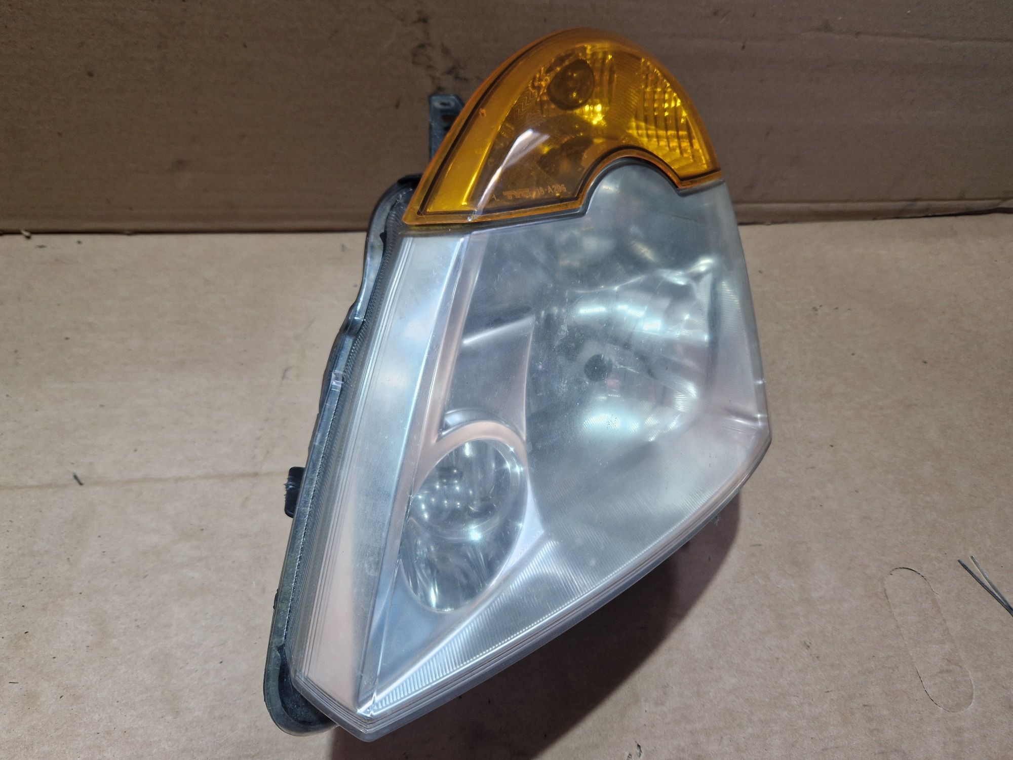 Lampa reflektor lewa lewy przód przedni Renault Modus Europa