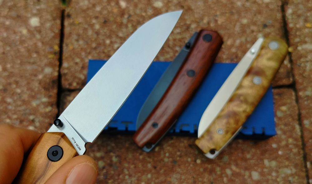 Nóż Petrified Fish 719 drewno