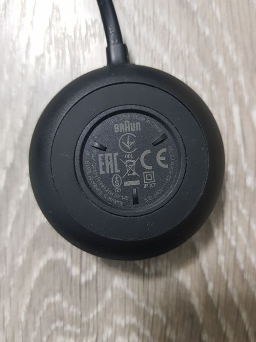 Зарядний пристрій для індуктивної електричной зубної щітки