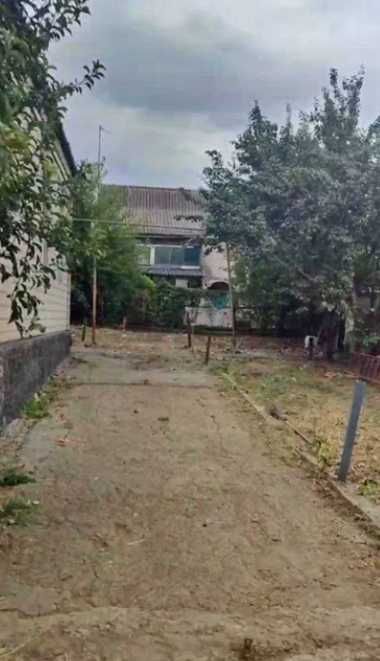 Продам кирпичный Дом на поселке  Строителей в городе Каменское.