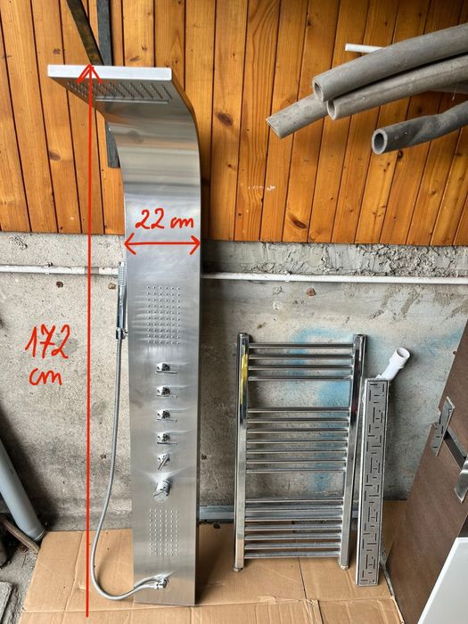 Meble łazienkowe, umywalka, deszczownica i grzejnik