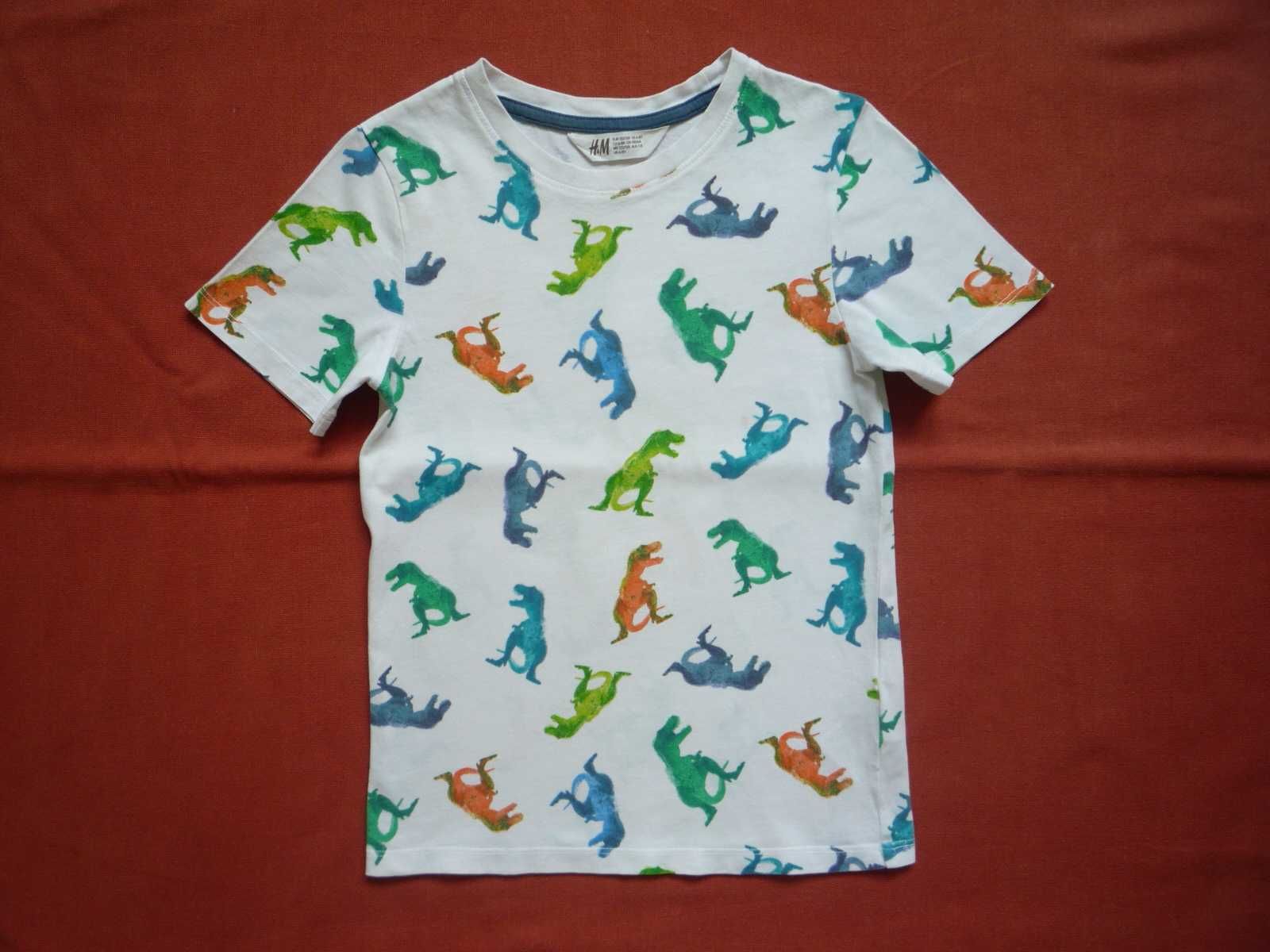 H&M r. 122/128 Biała koszulka w kolorowe dinozaury
