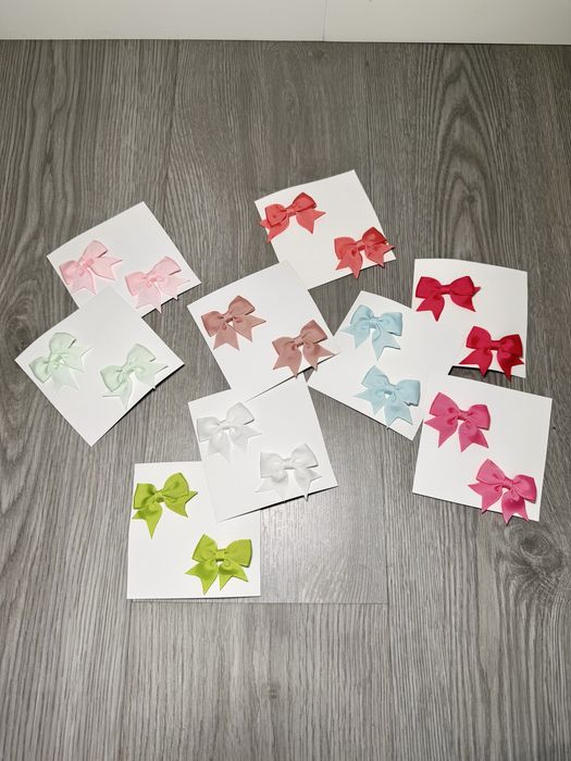 9 pares de ganchos laços menina - novos