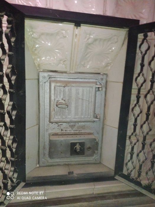 Elegancki narożny piec kaflowy z wkładem elektrycznym