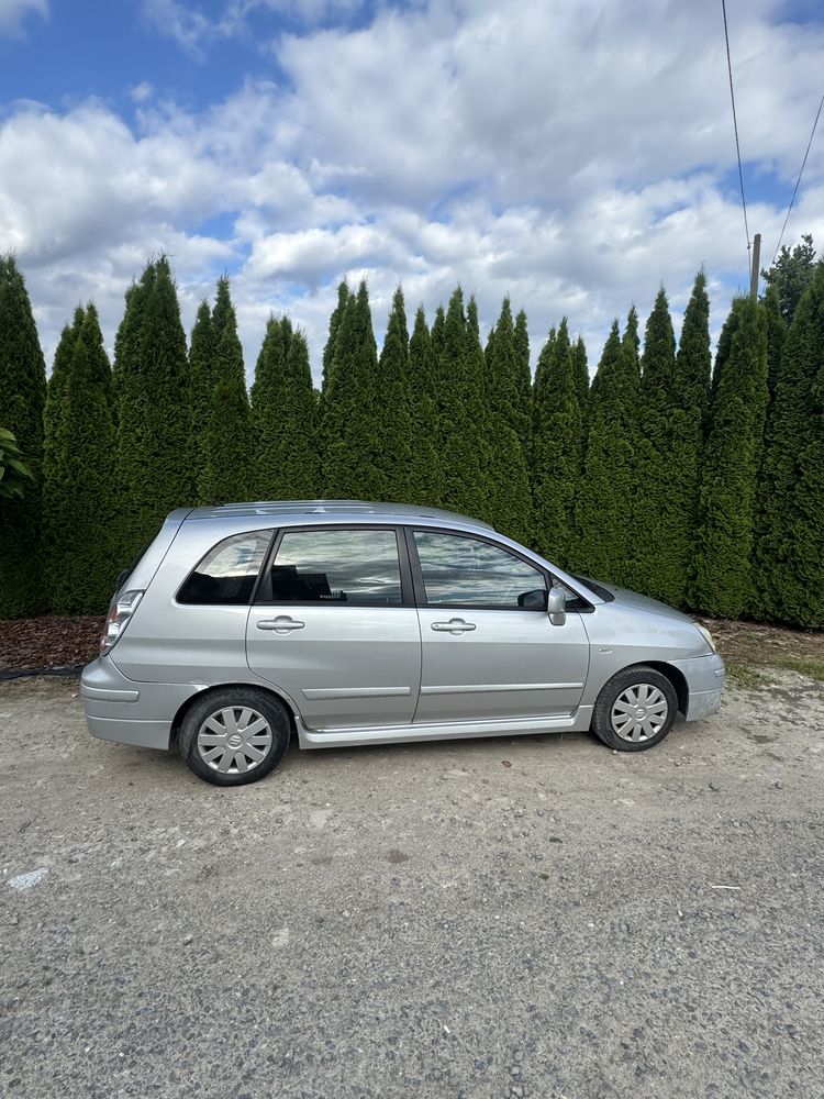 Suzuki Liana 1,6 benzyna , 125 koni , sprawy