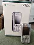 Sony Ericsson K700i + pudełko, dokumenty, płyta CD, słuchawki