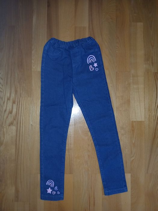 Nowe spodnie jeansowe r.134