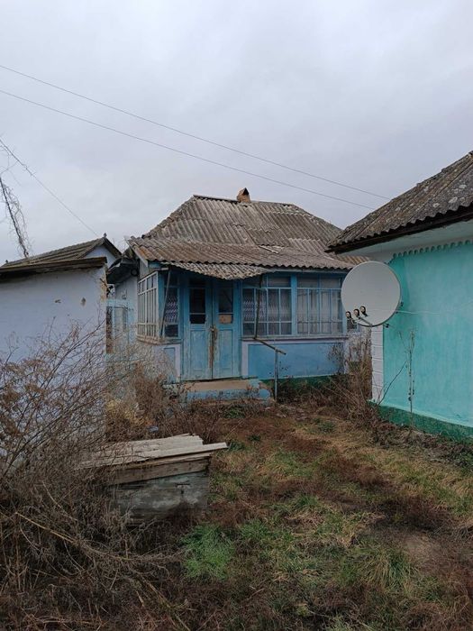 Хата з гоподарчими прибудовами