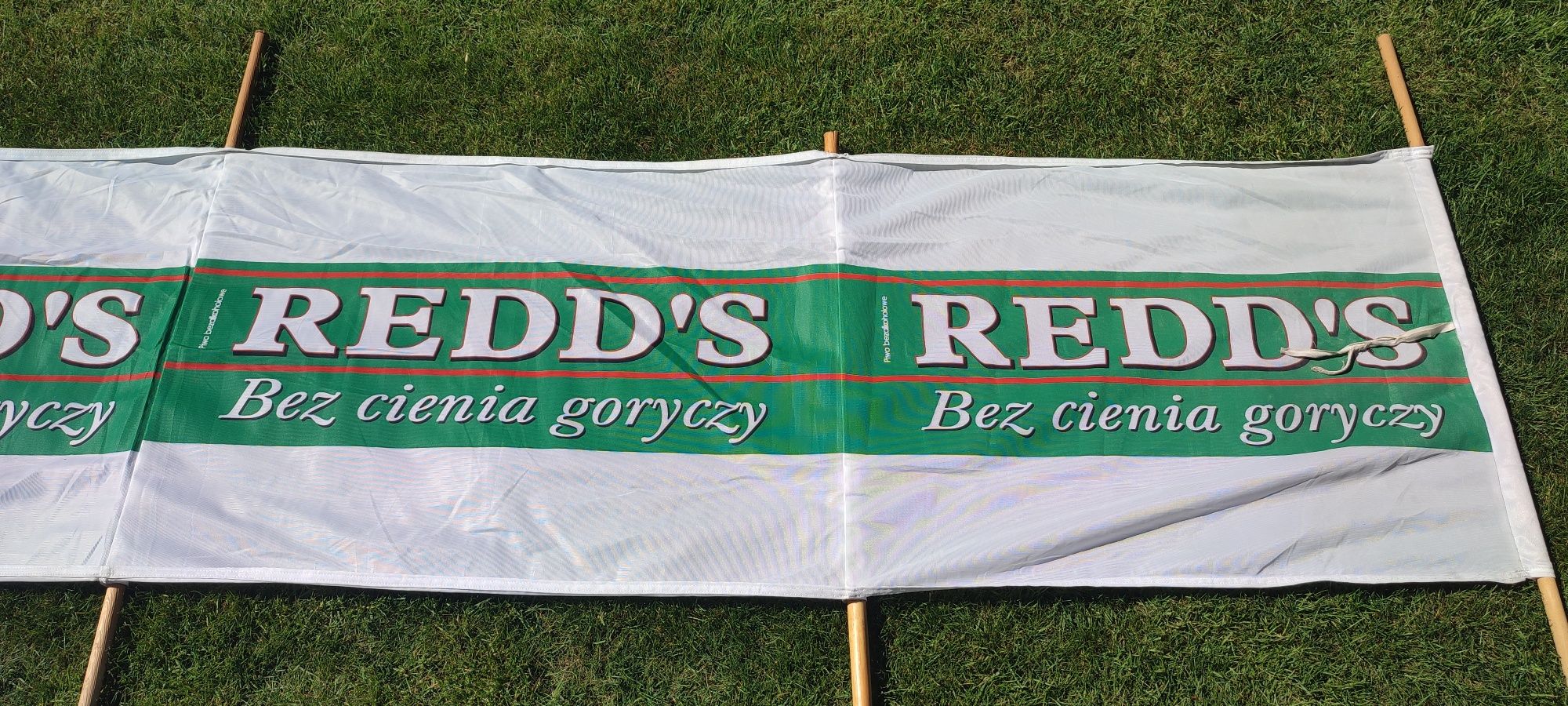 Parawan reklamowy piwa Redds - Lata 90te