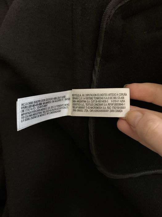 Чорне двобортне довге пальто з вовною вільного прямого крою від zara