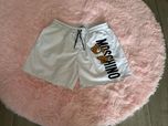 Białe kąpielowki męskie Moschino rozmiar 2XL
