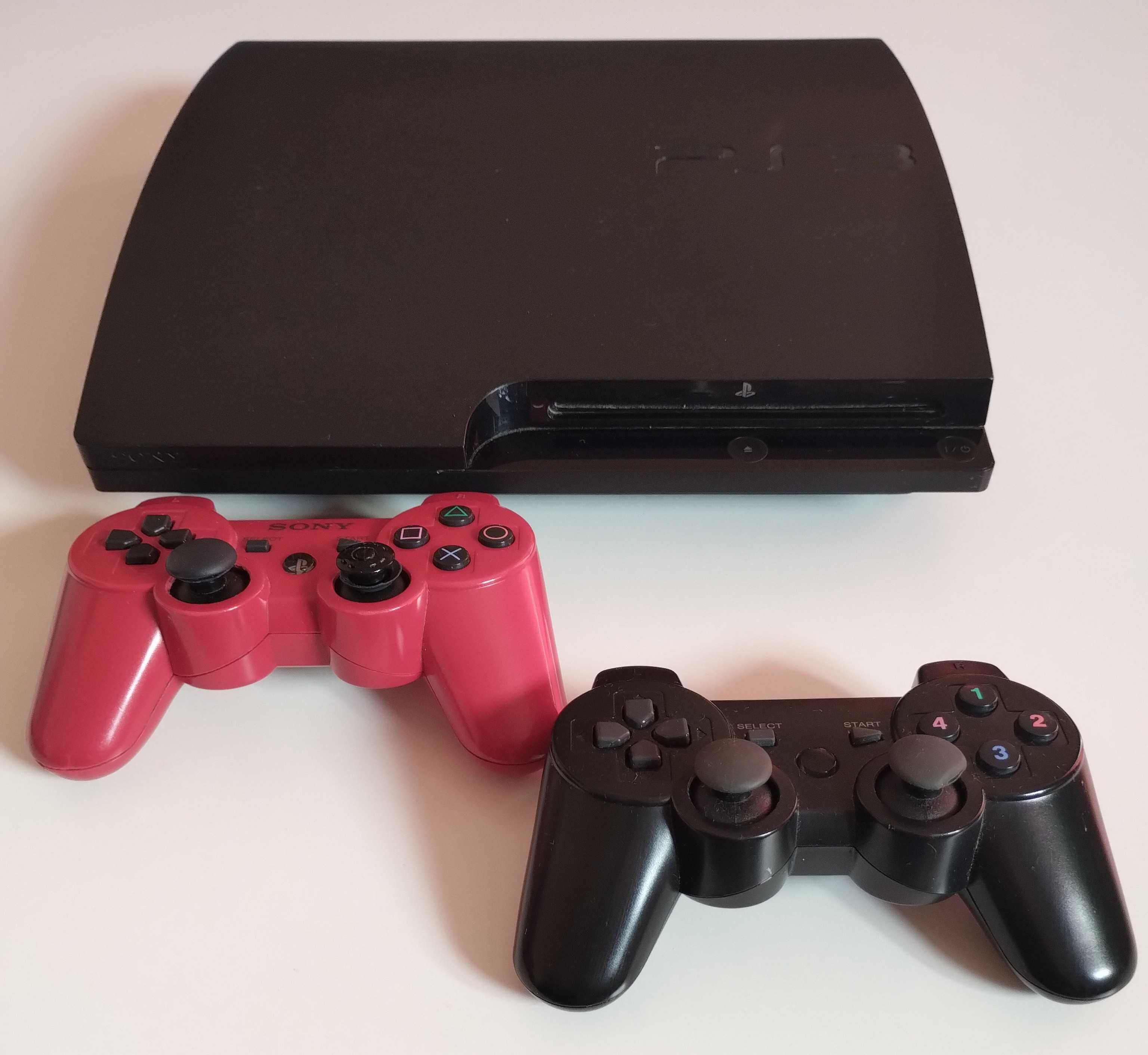 Konsola Sony PS3 + dwa pady + dwa kontrolery Move +  14 płyt z grami