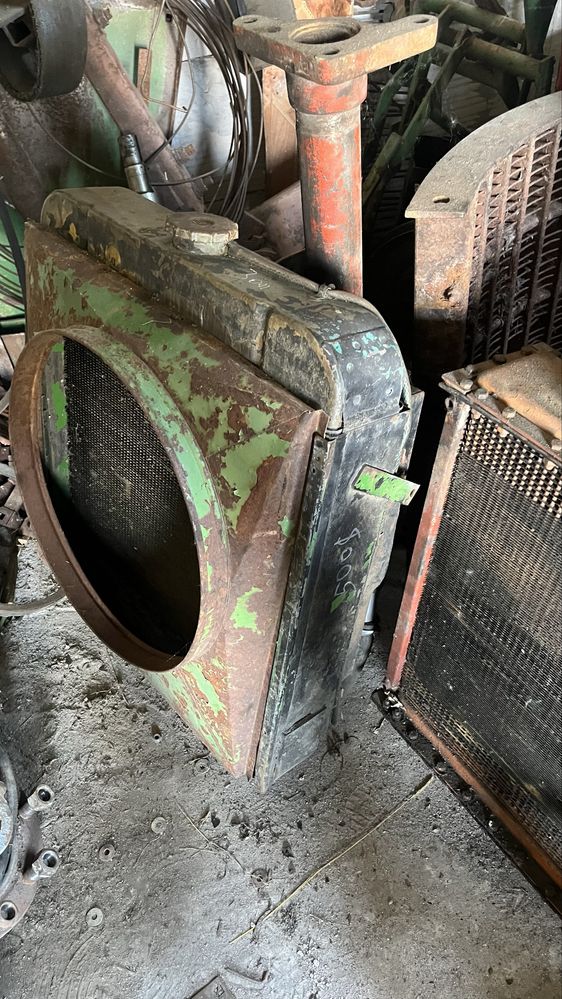 Радіатори,вали,бітери,цапфи,решета до комбайна John Deere Джон
