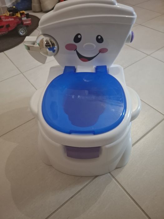 Nocnik Fisher price grający