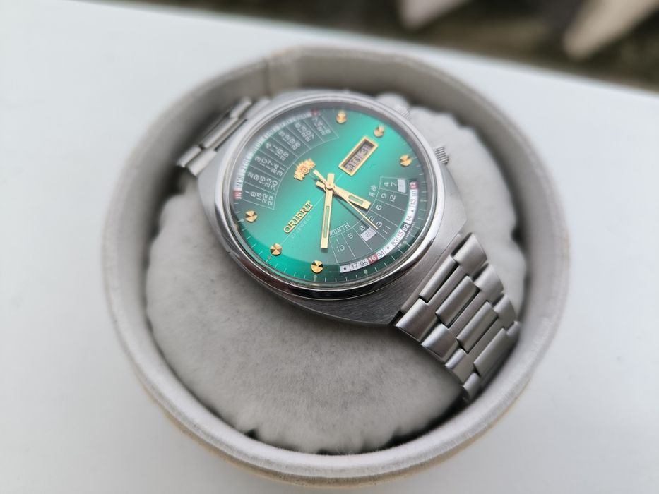 STAN NOWY zegarek orient zieleń cesarski patelnia królewski multi year