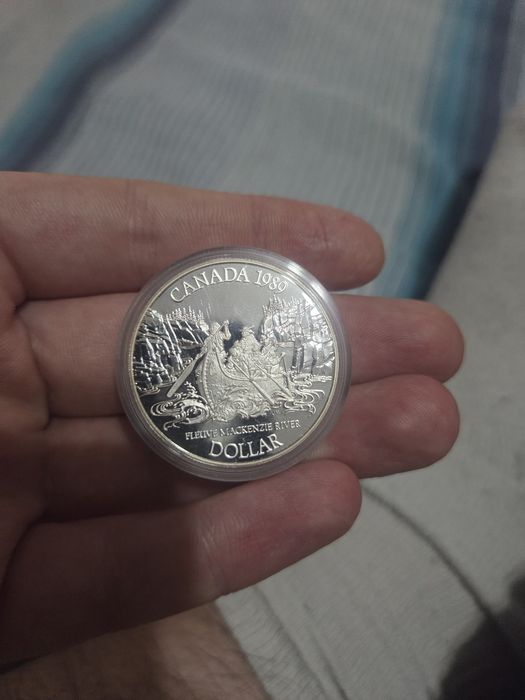 kanadyjska srebrna moneta kolekcjonerska o nominale 1 dolara z 1989