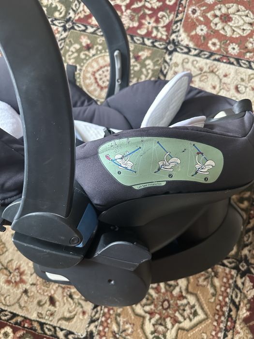 Автокресло люлька с 0+ Stokke