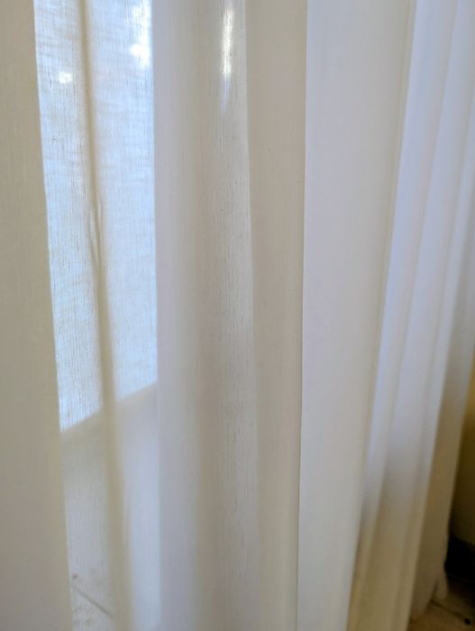 Біла тюль на вікна