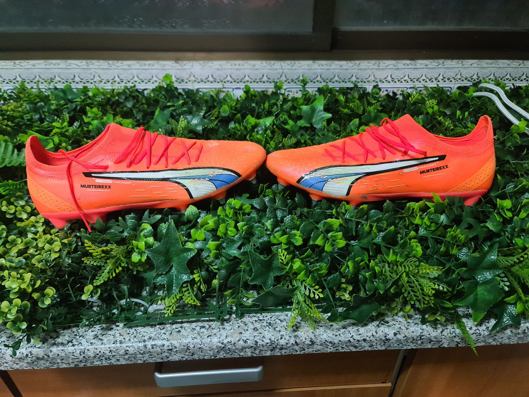 Chuteiras da Nike com pitons de alumínio