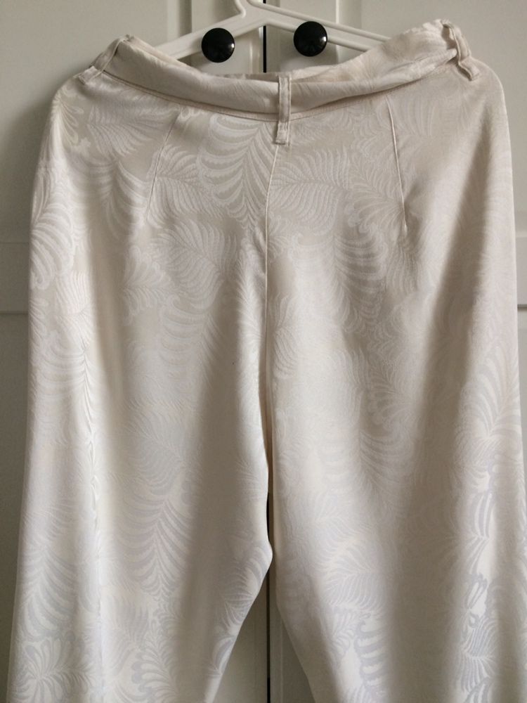 Letnie damskie spodnie h&m kremowe w kwiaty z wysokim stanem 38