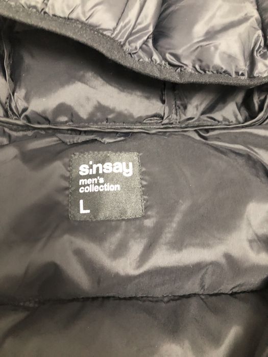 Пухова жилетка безрукавка пуховик